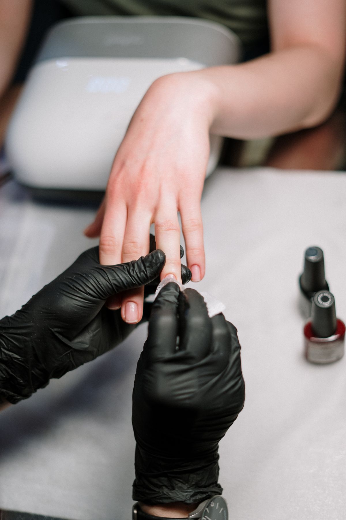 Gel manicure in progress at a nail appointment